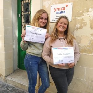 2023 Interns receive their certificate of participation from the YMCA Malta
