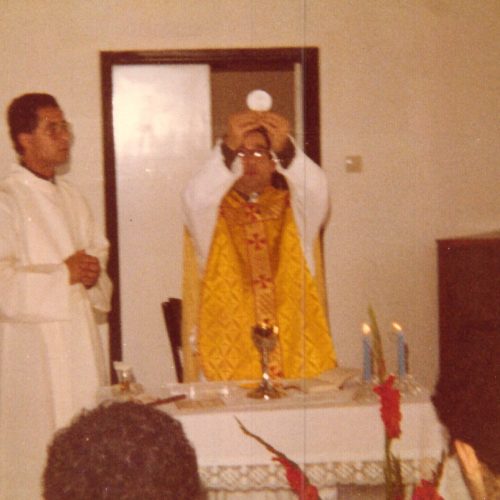 A priest gives Mass.