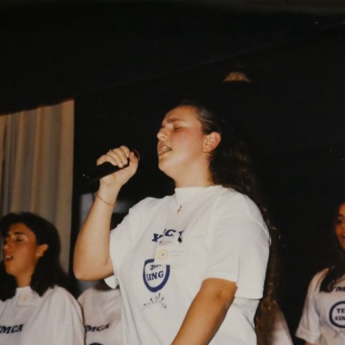 A young participant in Ten Sing sings from her soul on stage.