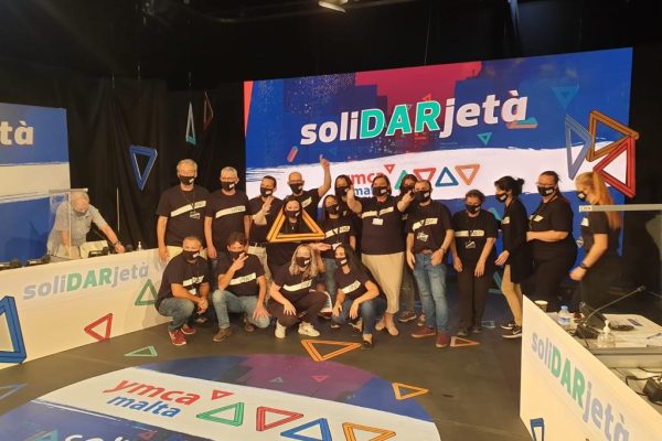 The backstage crew gathers for a photo during our first SoliDARjeta Marathon.