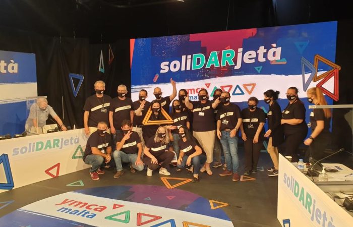The backstage crew gathers for a photo during our first SoliDARjeta Marathon.