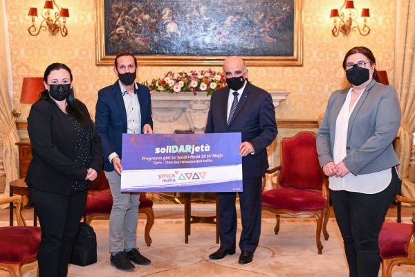 President of Malta George Vella Endorses the inaugural SoliDARjeta in this photo taken in May of that year.