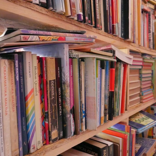 Close-up of second-hand books available at the Shop.